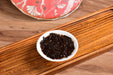 2025 Yunnan Sourcing "Peerless Red Label" Ripe Pu-erh Tea Cake | Yunnan Sourcing Tea Shop
