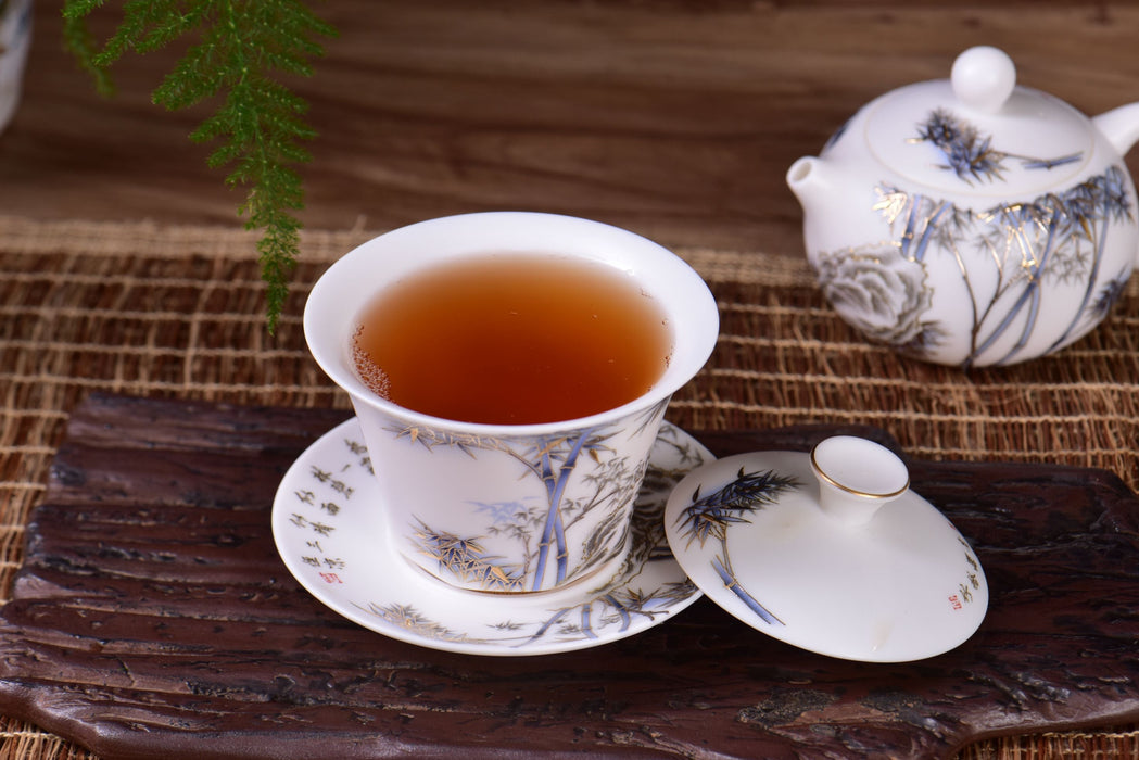 Mutton Fat Jade Porcelain "Blue and Gold Bamboo" Tea Set