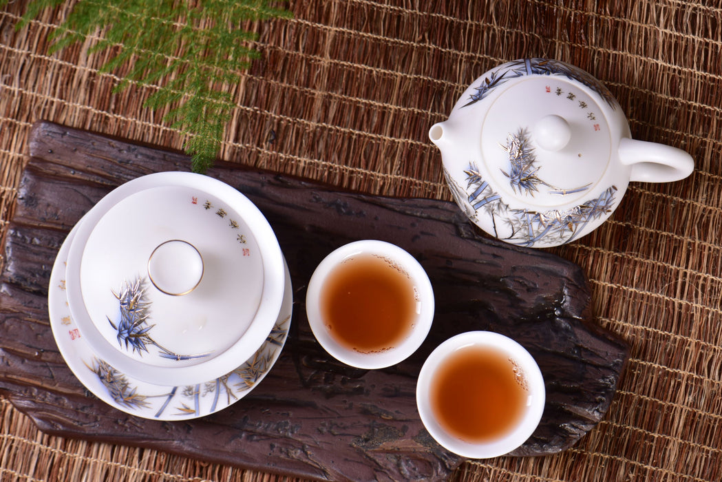 Mutton Fat Jade Porcelain "Blue and Gold Bamboo" Tea Set