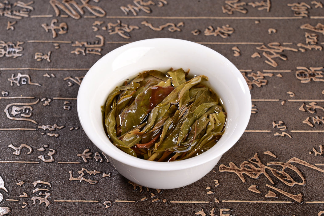 2024 Yunnan Sourcing "Xi Niu Tang Pasha" Raw Pu-erh Tea Cake