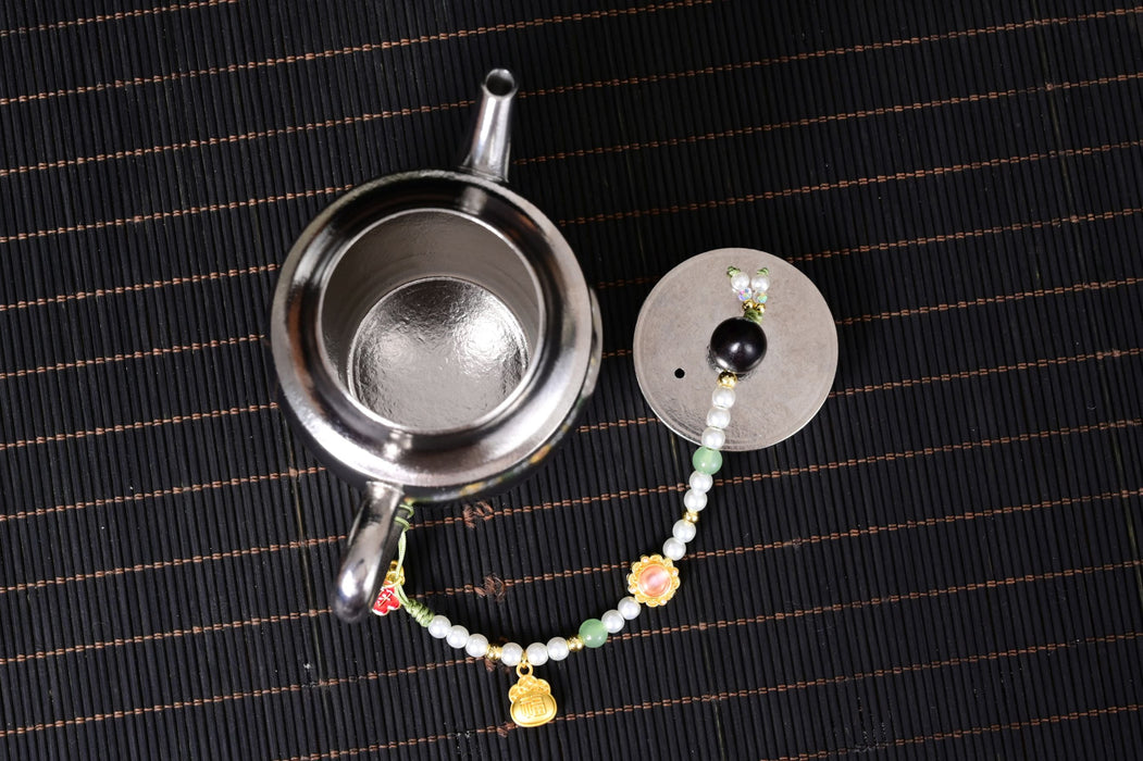 Titanium Pear-Shaped Teapot for Gong Fu Tea Brewing | Yunnan Sourcing Tea Shop