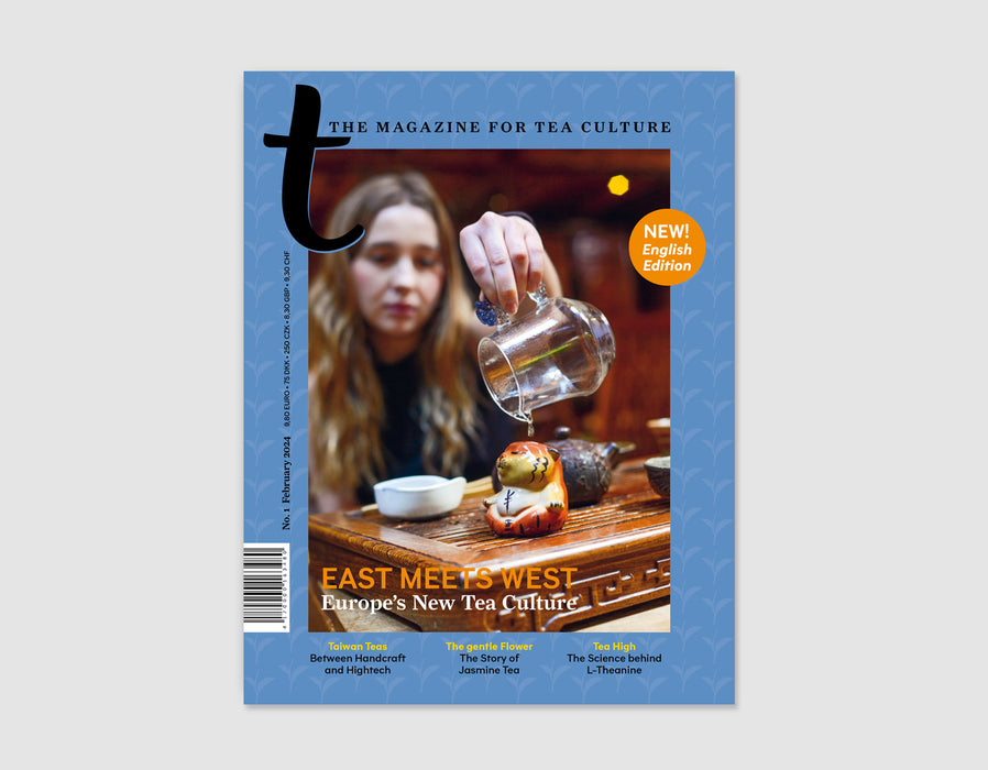A magazine cover for 'The Magazine for Tea Culture' featuring a woman pouring tea, with a blue border and orange circular badge reading 'New English Edition'.