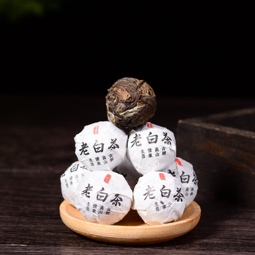 Compressed White Tea Compressed White Tea — Yunnan Sourcing USA
