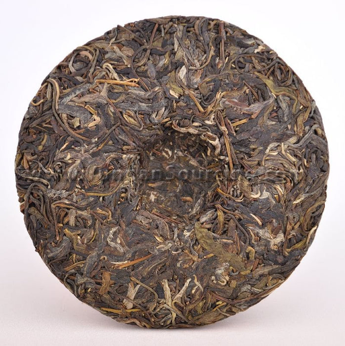 2010 Yunnan Sourcing "Ding Jia Zhai" Autumn Harvest Yi Wu Pu-erh Tea Cake