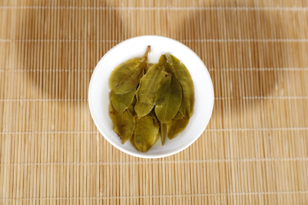 2018 Yunnan Sourcing "He Tao Di Village" Raw Pu-erh Tea Cake