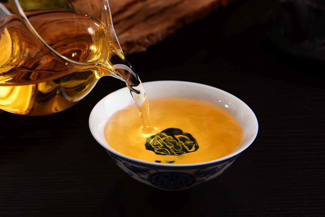 2020 Yunnan Sourcing "Bai Hua Tan" Yi Wu Raw Pu-erh Tea Cake