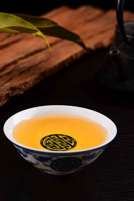 2020 Yunnan Sourcing "Bai Hua Tan" Yi Wu Raw Pu-erh Tea Cake