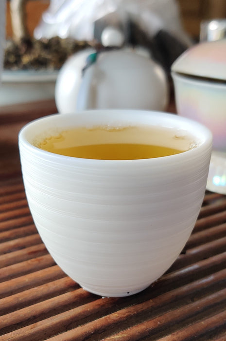 Mutton Fat Jade Porcelain "Egg-Shaped Spun" Tea Cup