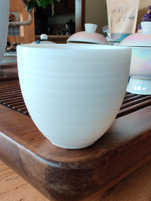 Mutton Fat Jade Porcelain "Egg-Shaped Spun" Tea Cup