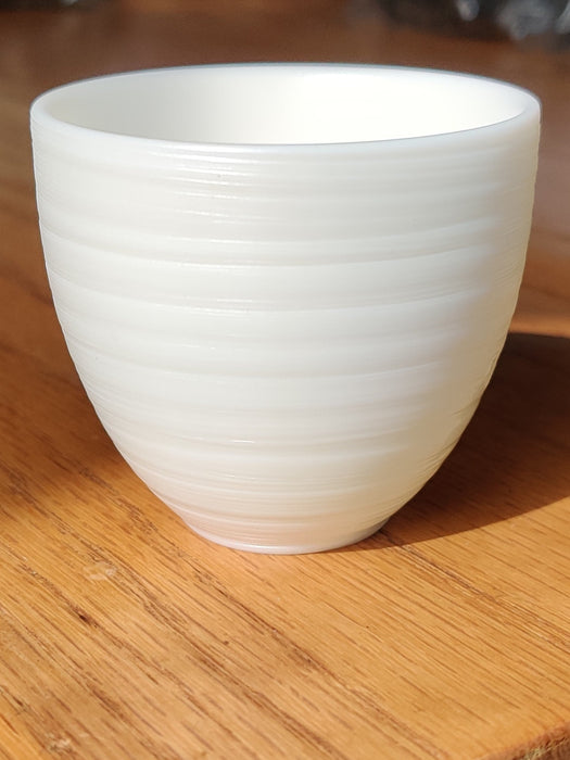 Mutton Fat Jade Porcelain "Egg-Shaped Spun" Tea Cup